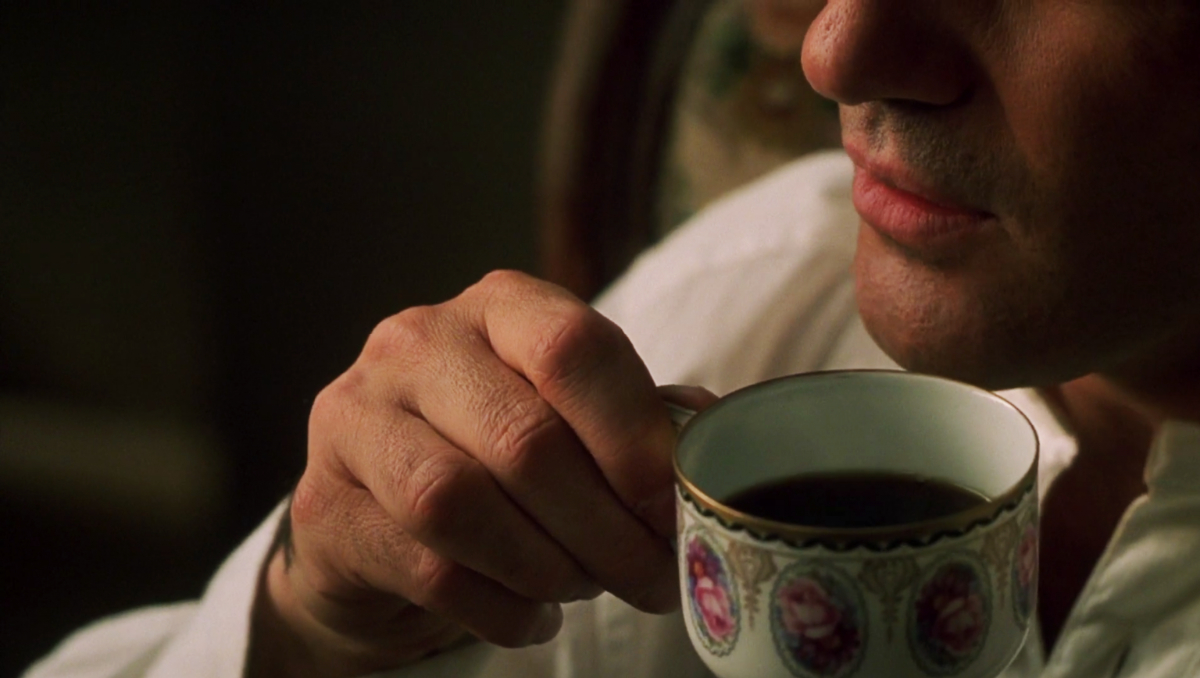 Luis (Antonio Banderas) with a cup of coffee in 'Original Sin'